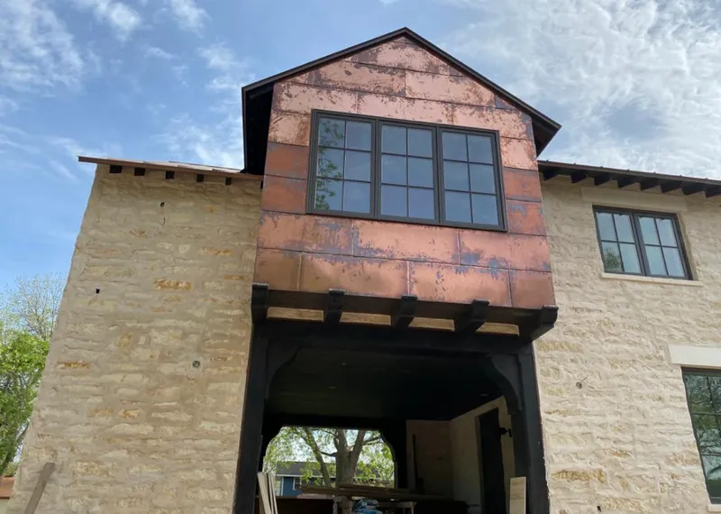 Copper metal panel facade on a stone building for Metal Roof Coating in Pinole